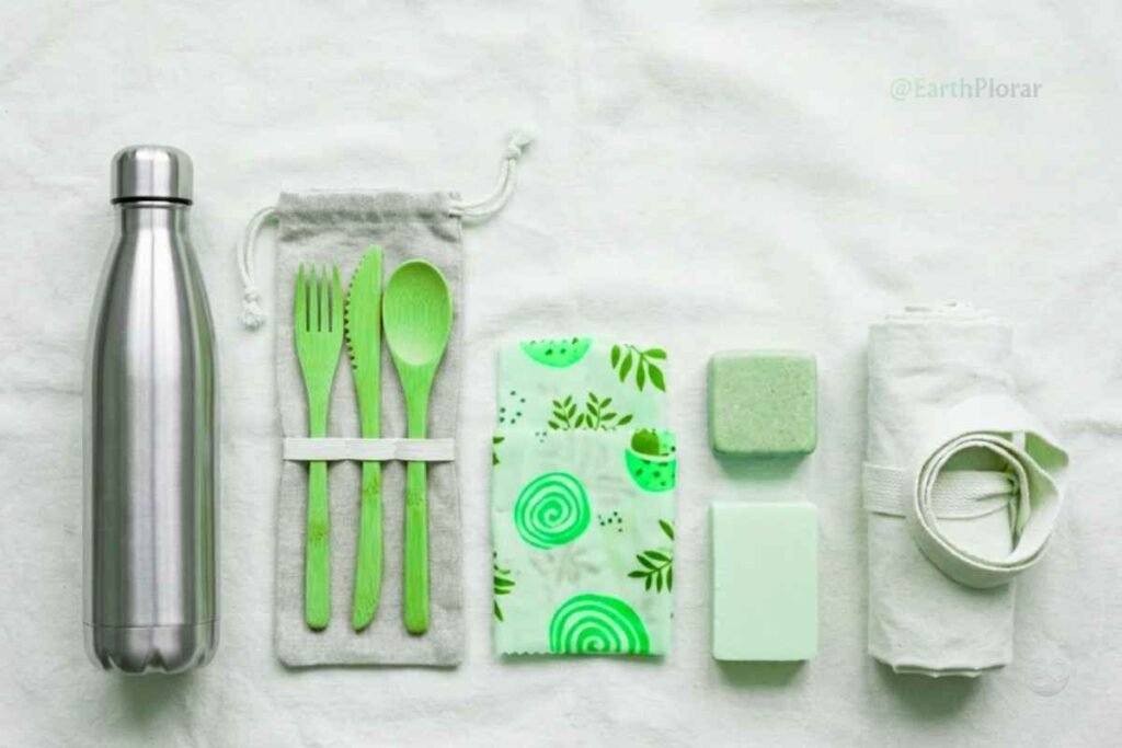 A zero waste travel flat lay for an eco-friendly adventure trip packing list.