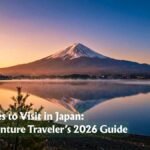 Wide panoramic view of Mount Fuji reflected in Kawaguchiko Lake at golden hour, best places to visit in Japan