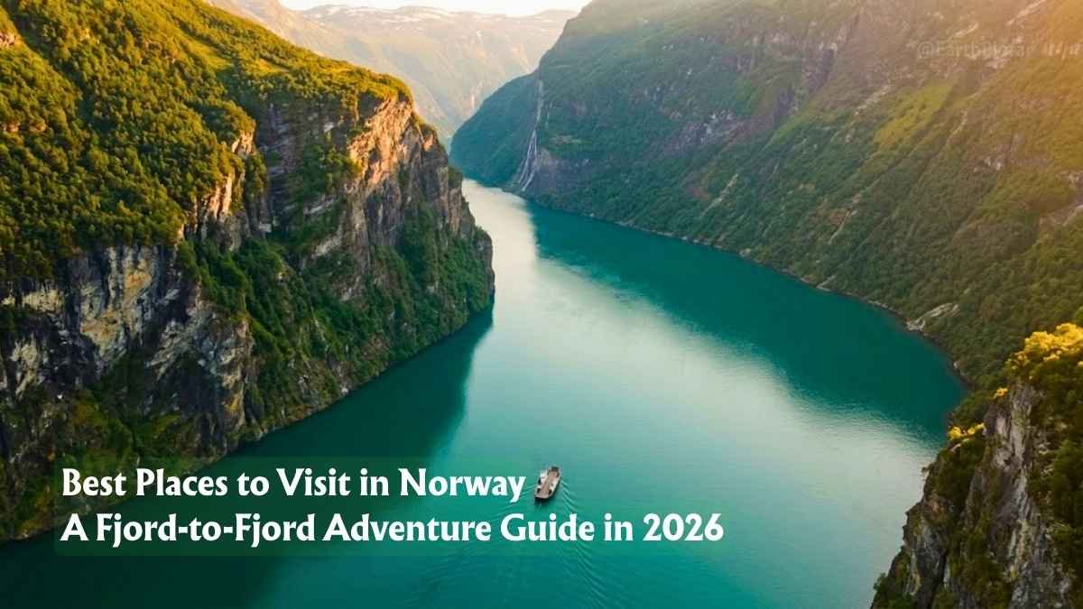 Aerial view of a narrow Norwegian fjord between steep green cliffs, one of the best places to visit in Norway