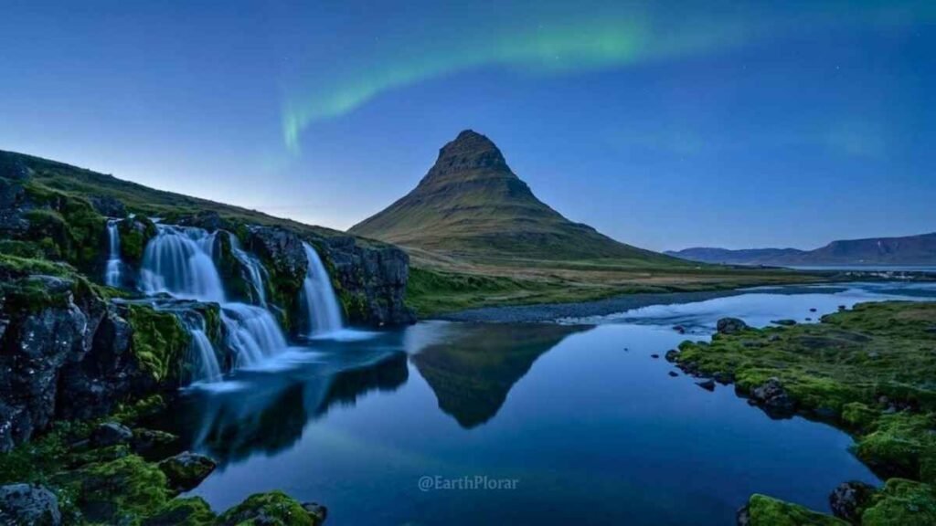 Kirkjufell mountain reflected in Kirkjufellsfoss waterfall at blue hour on the Snæfellsnes Peninsula, Iceland bucket list